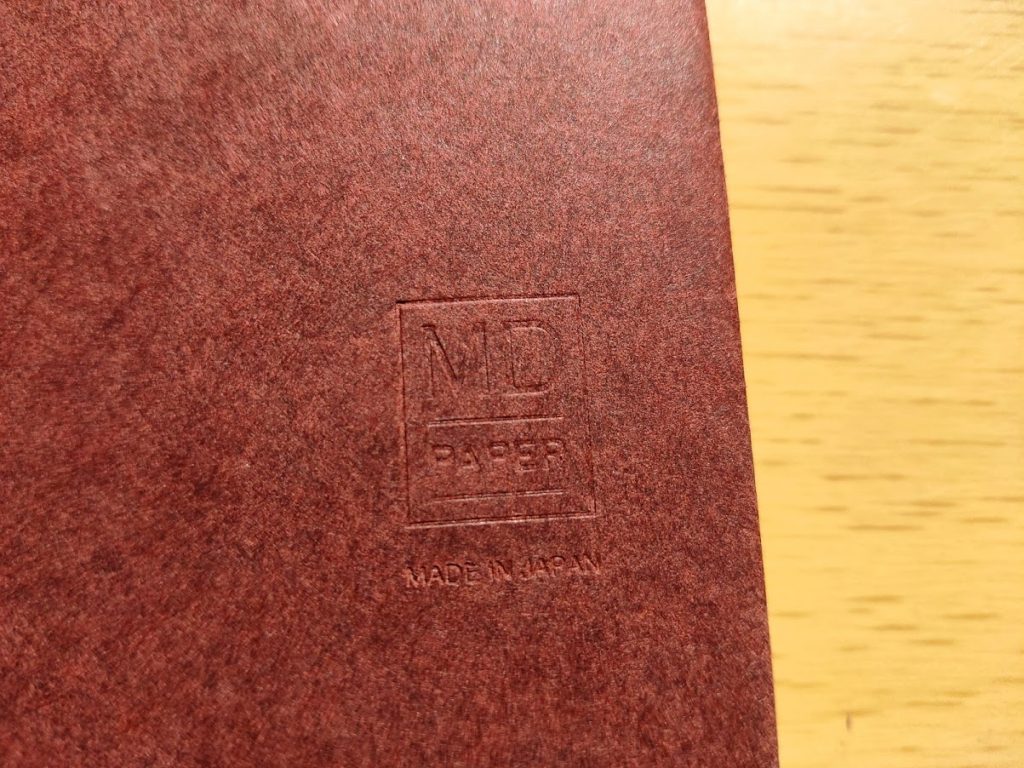 midori paper book cover logo