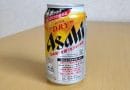 asahi draft beer can on a wooden table