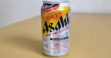 asahi draft beer can on a wooden table
