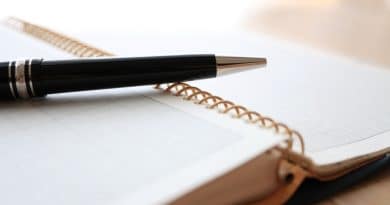ballpoint pen on a ring notebook